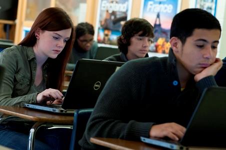 photo of students on laptops photo of students on laptops